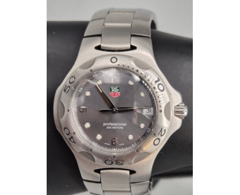 TAG HEUER - a stainless steel Kirium Professional 200M quartz calendar bracelet watch, ref. WL1111. Comes with original box, 