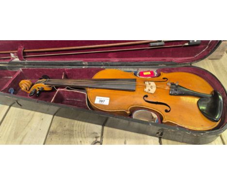 Antique violin; Copy of Antonius Stradivarius in case with bow. 60cm Length. 