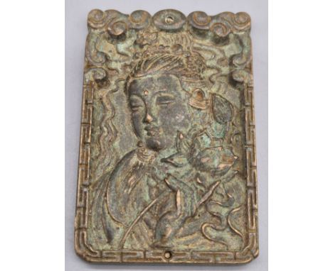 A Tibetan Bronze amulet. 7x4.5cm. 
