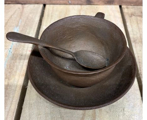 Bronze Sculpture of a tea cup, saucer and spoon. Unsigned.