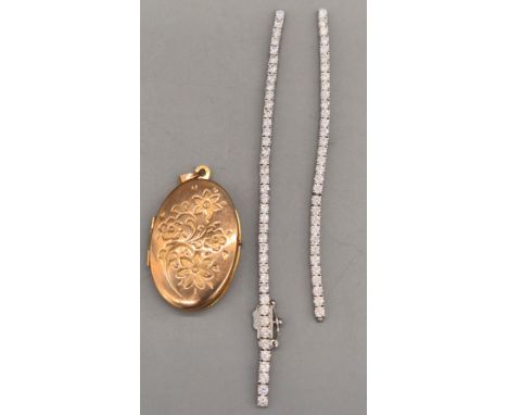 9ct yellow gold locket- 4.68grams. Together with a broken silver tennis bracelet. 