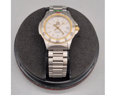 TAG HEUER - a stainless steel 4000 Series 200M automatic bracelet watch. Silver dial. In a working condition with original bo