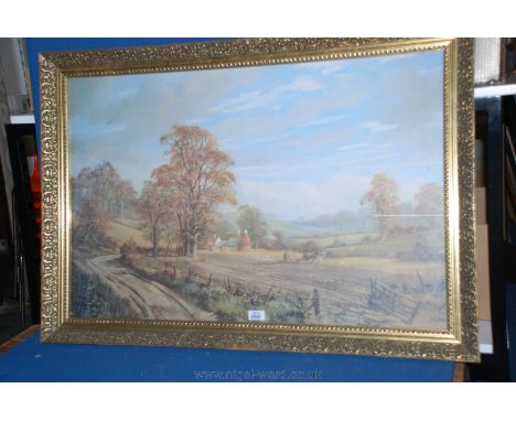 A large Don Vaughan Print of a Farmer and his two horses ploughing with the farmstead in the distance, 34'' x 22 1/2''.