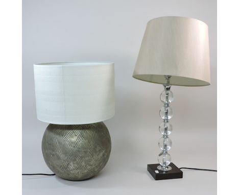 A modern glass table lamp, on a wooden base, with shade, 62cm tall overall, together with a metal lamp with shade, 45cm tall 