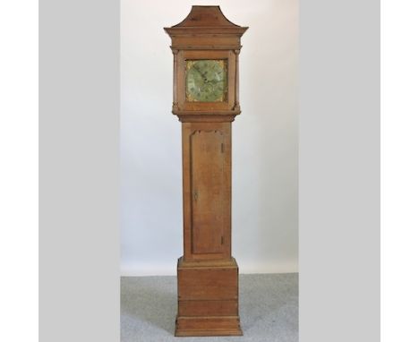 An 18th century oak cased longcase clock, with a brass dial and thirty hour movement, 214cm tall