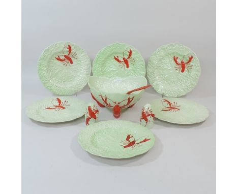 A Carltonware lobster pattern salad dish, together with matching servers, cruets and plates
