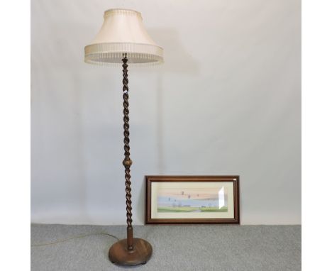 A 1930's oak barley twist standard lamp, 176cm tall, together with English School, 20th century, landscape with balloons, sig