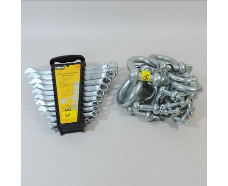 A collection of forty bow shackles, together with a twenty two piece spanner set