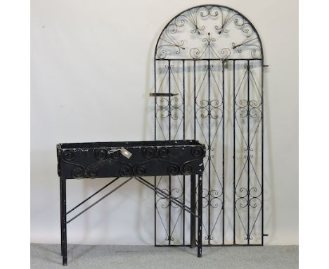 A wrought iron garden gate, 83cm, together with an ornate iron garden planter, 103cm