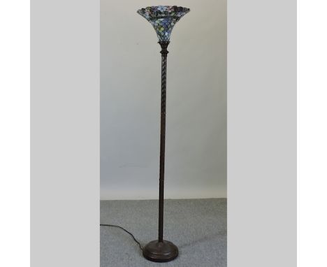 A Tiffany style standard lamp, with a leaded glass shade, 181cm tall