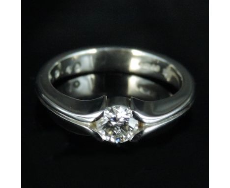A platinum and diamond single stone ring, by Christopher Wharton
