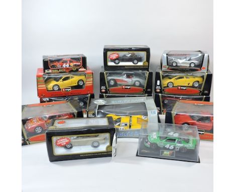 A collection of Burago and Revell boxed diecast 1/18 scale model cars