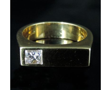 An 18 carat gold single stone signet ring