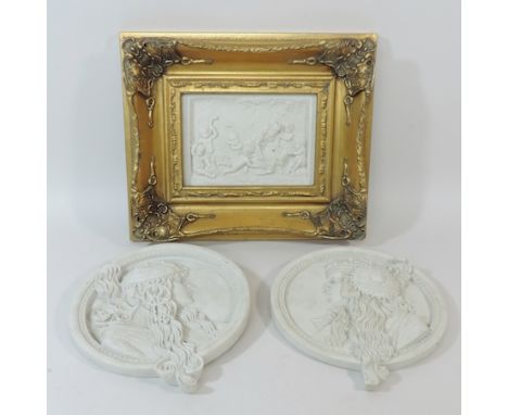 A pair of Art Nouveau style portrait plaques, tallest 22cm, together with another, framed