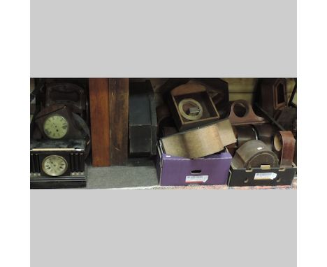 A collection of clock parts to include cases and mantle clocks