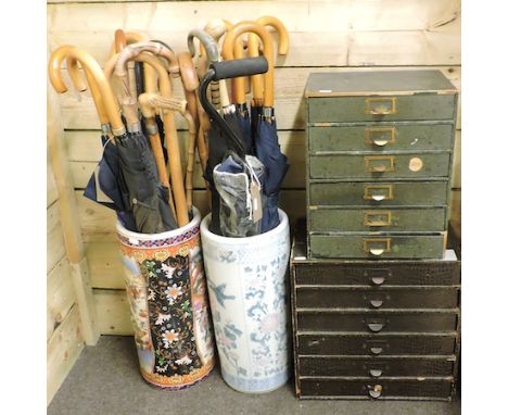 A collector's chest, containing artist's materials, together with another, two pottery stick stands, walking sticks and umbre