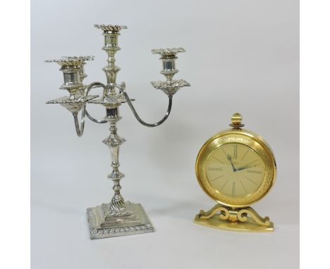 A silver plated candelabra, by Mappin & Webb, 39cm tall, together with a Junghans Meister brass cased mantel clock, 23cm tall