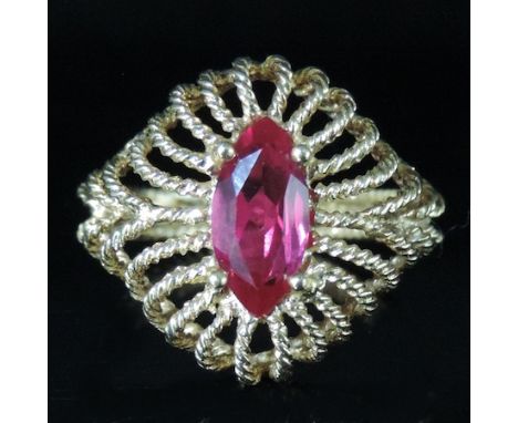 An 18 carat twisted gold gem set dress ring, boxed