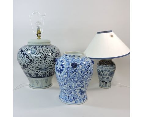 A blue and white pottery lamp base, 42cm tall, together with another smaller and a blue and white vase