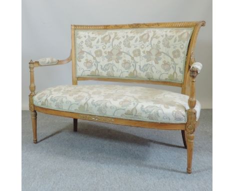 A 19th century carved beech and cream upholstered sofa, on turned legs, 130cm