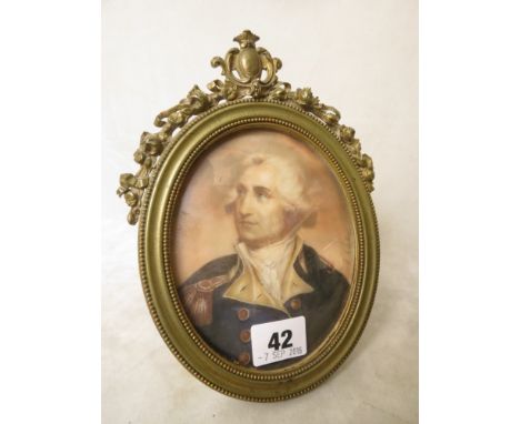 A miniature portrait of George Washington, mounted and glazed in a brass frame, signed I Rarten? right side edge, 5 long