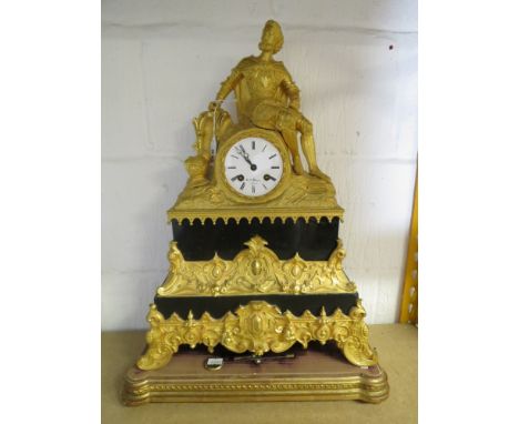 Henry Marc, Paris, a French mantle clock in an ornate ormolu and black slate case, white enamelled Roman dial  marked HY Marc