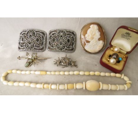 Jewellery to include a Victorian shell cameo brooch depicting a bust of a classical maiden in a silver gilt setting, Edwardia