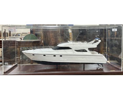 A Lyndhurst Enterprise Models scale model "Princess 58" motor cruiser under a perspex display case 102 cm x 35.5 cm x 40 cm h