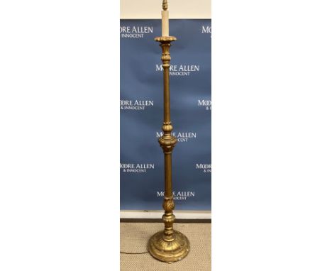 A circa 1900 carved giltwood and gesso standard lamp in the Classical style with flower head and foliate decoration and candl