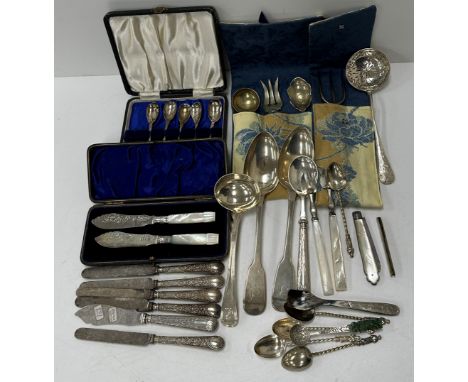 A collection of silver and silver plated cutlery to include a pair of "Fiddle" pattern serving spoons (London 1828), a silver