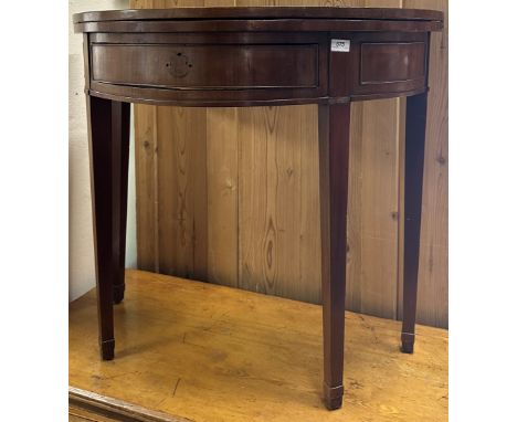 A 19th Century mahogany demi-lune fold over card table with single frieze drawer on square tapered and collared supports 88 c