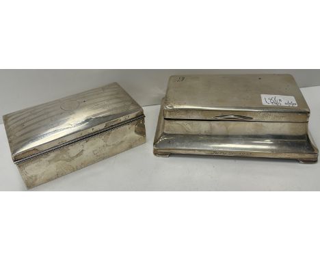 A mid 20th Century silver cigarette box with hinged lid of rectangular flared form, initialled to top and inscribed "July 21s