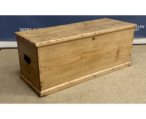 A Victorian pine trunk of plain form 105 cm wide x 40 cm deep x 43 cm high