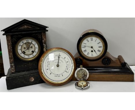 A Victorian marble cased mantel clock of architectural form, the eight day movement with visible escapement and Arabic numera