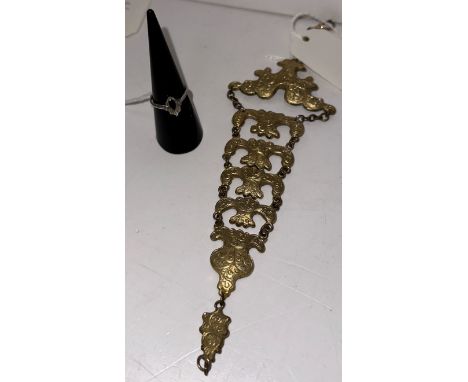 A white metal ring mount/blank size M together with a gilt metal chatelaine chain in the Oriental manner 18 cm long