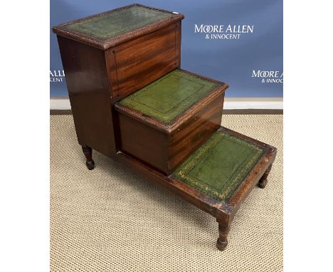 A 19th Century mahogany set of bed steps, the upper tier with rising top, the centre tier with rising top opening to reveal a