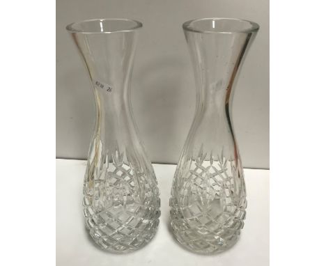 A pair of Rye Pottery cockatoo figures circa 2002, a pair of pineapple cut glass vases with flared rims, a Continental bubble