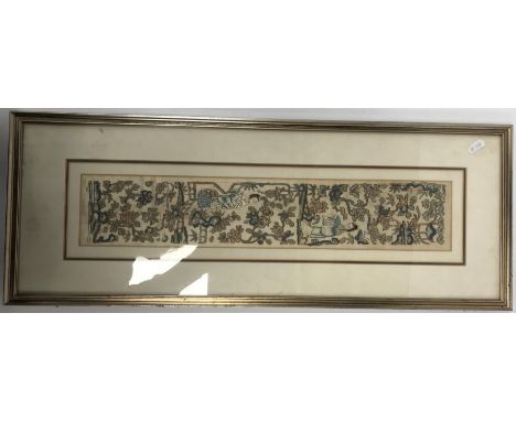 A 19th Century Chinese silk embroidered panel depicting "Figures in foliate set ground", 51 cm x 9.5 cm