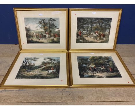 A set of four etching style hunting prints in gilt glazed frames 