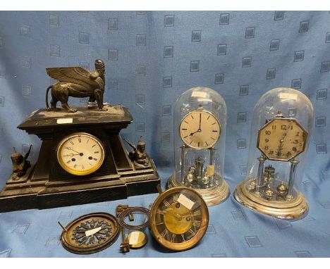 A slate mantle clock, topped by mythical beast with sphinx 43cm W x 16cm D x 39cm H and two mantle clocks in glass domes. Spa