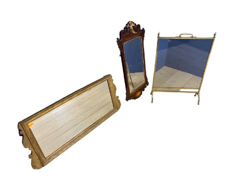A glass and brass fire screen, and a gilt framed long overmantel mirror, and another mahogany framed wall mirror, with gilt b