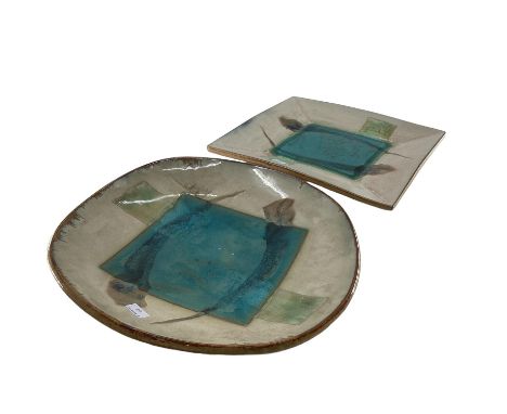Two large matching ceramic mid C20th chargers, Circular and square examples, with embossed marks stamped to base 45 x 41x41 