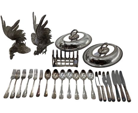 A matched pair of silver plated table ornaments each 28cmH, and other silver plated wares, birds, flatware, toast rack, chaff
