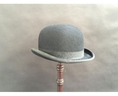 A Moss Bros black hunting bowler, 7 5/8