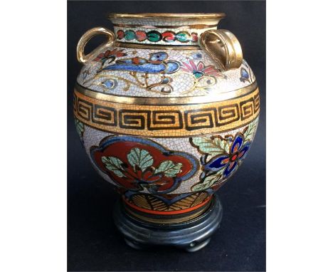 A vintage hand-painted gilded three-handled Japanese vase with stylized floral decoration and separate ceramic base, backstam