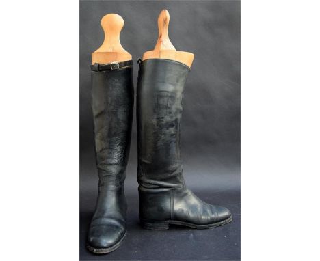 A pair of lady's black hunting boots, approximately 5-5 1/2 with fitted wooden trees
