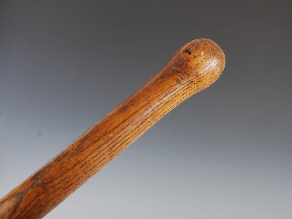 An antique pitch fork, with steel prongs and turned ash handle, 93cm long.