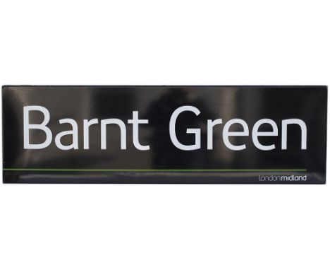 Modern image station sign LONDON MIDLAND BARNT GREEN. Fully flanged enamel in excellent condition measures 45.5in x 13.75in.