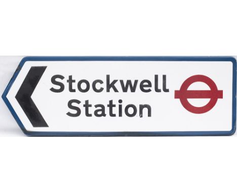 LT FF enamel direction sign STOCKWELL STATION with right facing arrow. In very good condition, measures 38.75in x 13in.