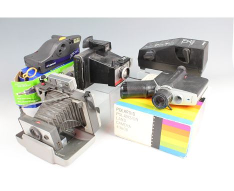 A Polaroid Automatic 103 Land Camera together with a Polavision Land Camera and three other Polaroid cameras